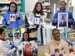 Supriti Ghosh, 伊莎贝尔尼克尔斯, 美琳娜Beykou, Sumana Shrestha和Erica Oliveira在实验室里拿着年轻时自己的照片