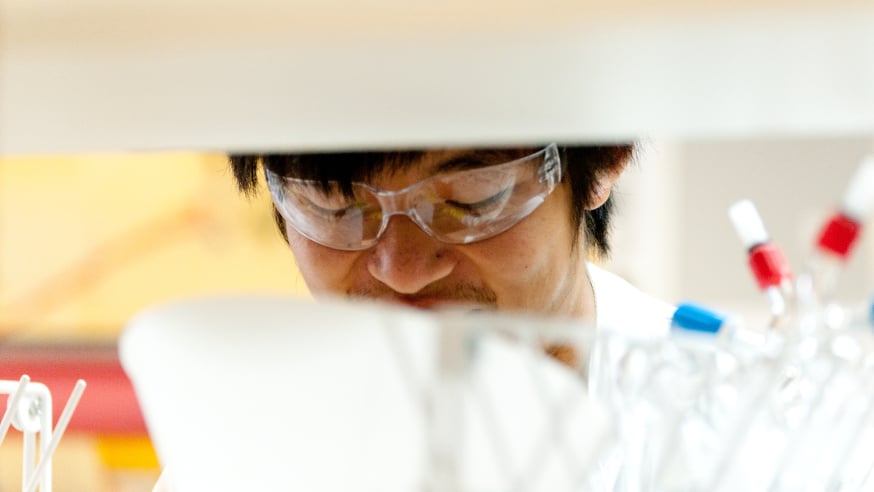 An ICR scientist working in the lab