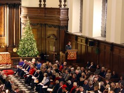 Edward Holcroft reading at Carols from Chelsea 2017 event