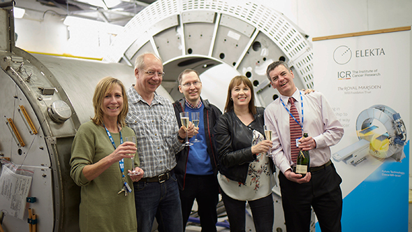 The research group involved in the installation of the MR-Linac celebrate the installation of the giant magnet (image courtesy of Elekta