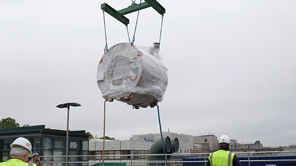 The MR-Linac magnet is lowered into position (image courtesy of Elekta)
