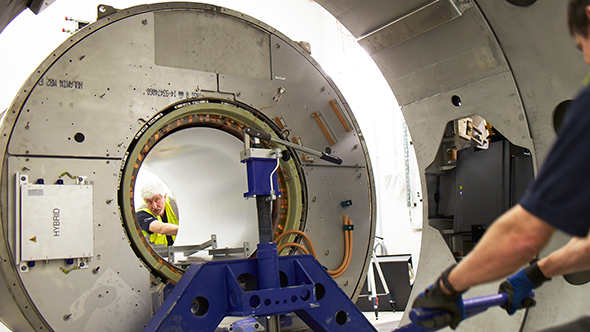 The heavy magnet for the MR-Linac is carefully manoeuvred (image courtesy of Elekta)