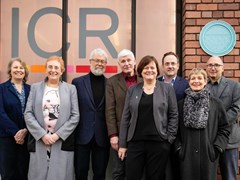 Group of scientists who discovered BRCA2 gene in 1995 standing next to new commemorative blue plaque at the ICR