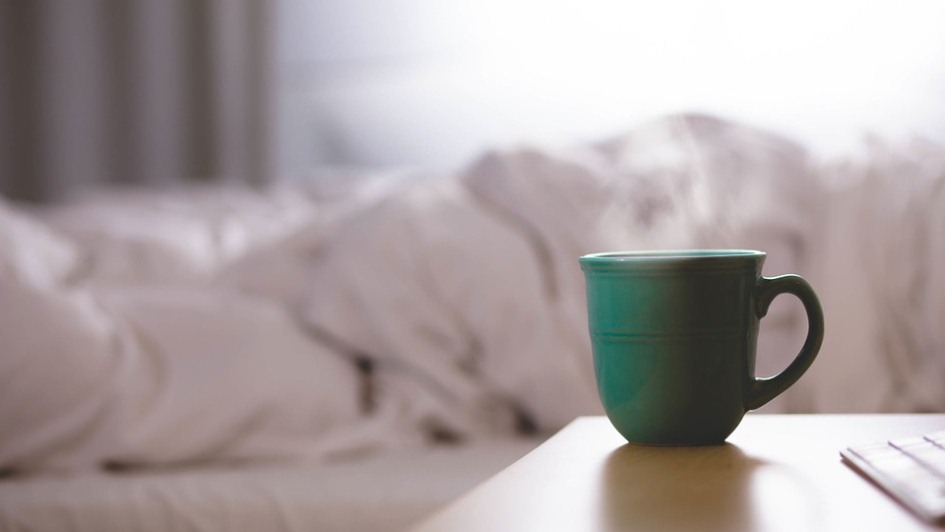 coffee cup on bedside table