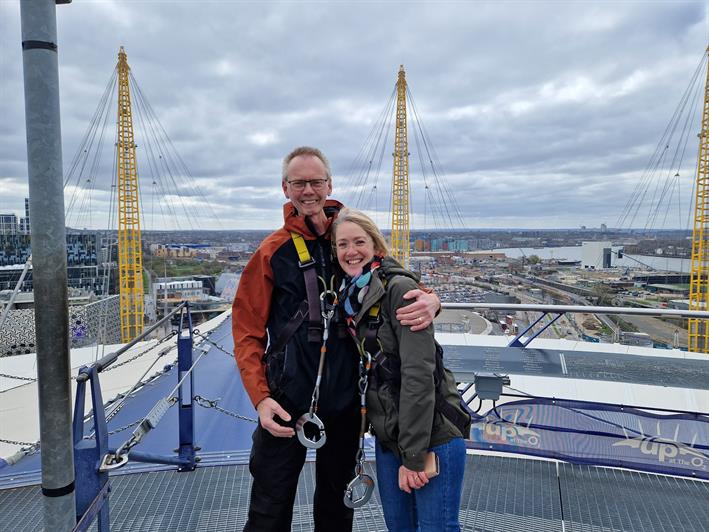 John Dabell with his wife after climbing the O2 in London
