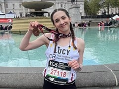 Lucy poses with her medal at Trafalgar Square
