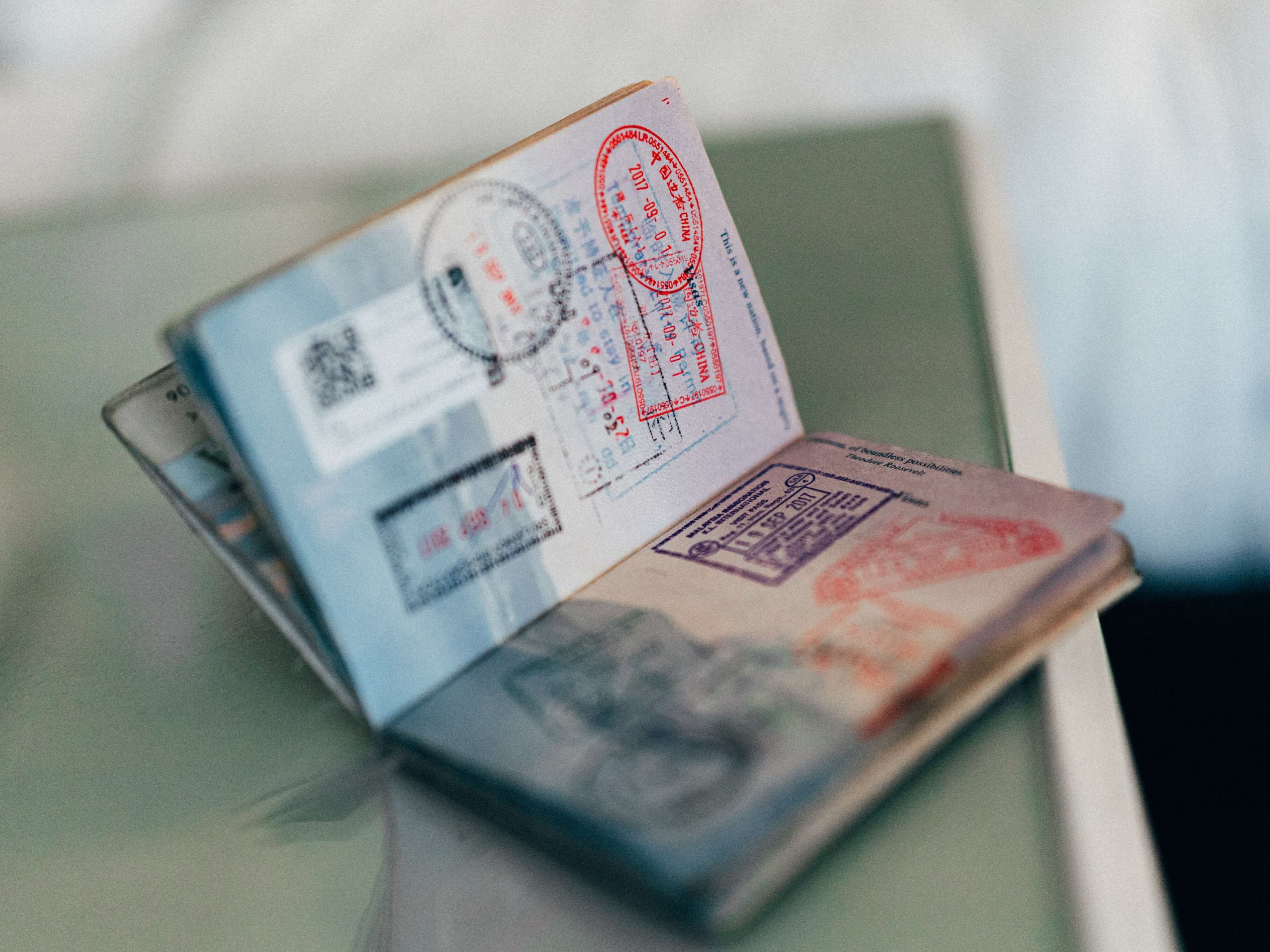 Open passport with stamps