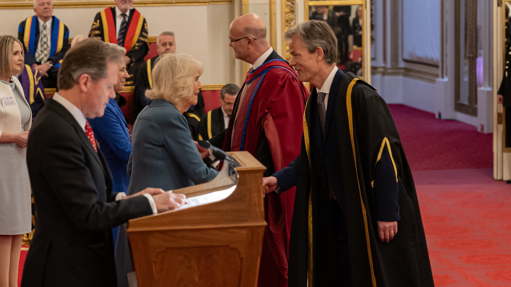 The ICR's CEO and Head of Breast Cancer Research receiving the Queen's Anniversary Prize from Her Majesty The Queen